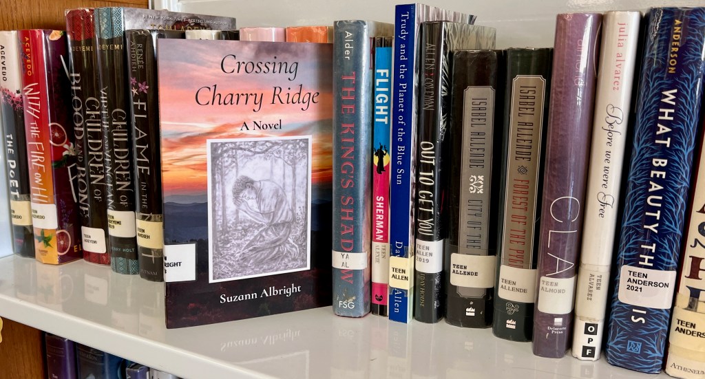 Crossing Charry Ridge on shelves of the Jessie Peterman Memorial Library in Floyd